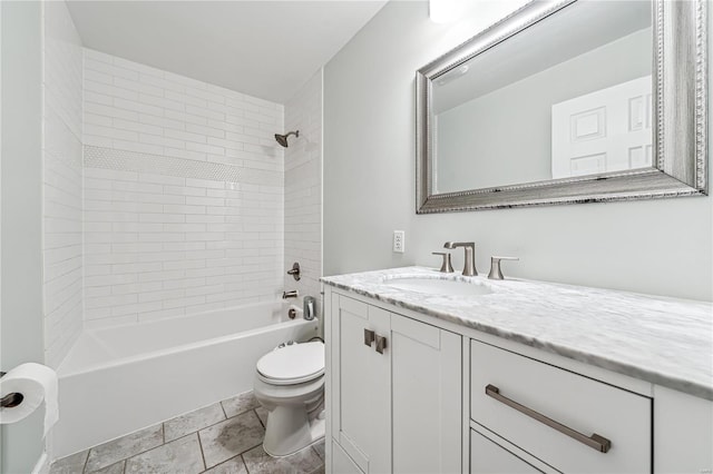 full bathroom featuring vanity, toilet, and tiled shower / bath combo