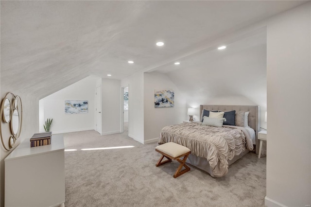 bedroom with lofted ceiling, recessed lighting, baseboards, and light colored carpet