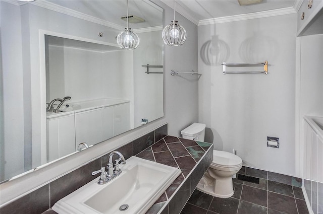 bathroom featuring ornamental molding, tile patterned floors, toilet, and sink