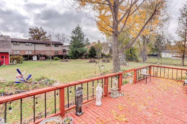 wooden deck with a yard