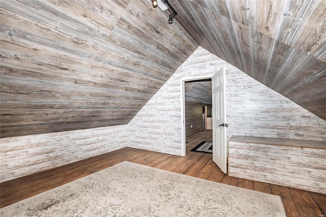 additional living space with wood-type flooring, wood ceiling, and vaulted ceiling