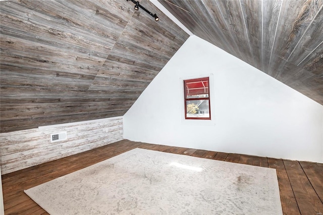 bonus room featuring dark wood-type flooring, wooden ceiling, and lofted ceiling