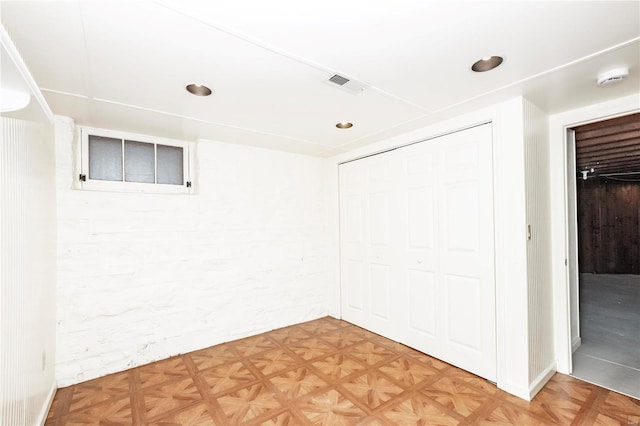 spare room with parquet flooring