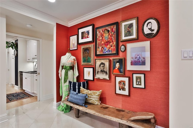 corridor featuring light hardwood / wood-style flooring and crown molding