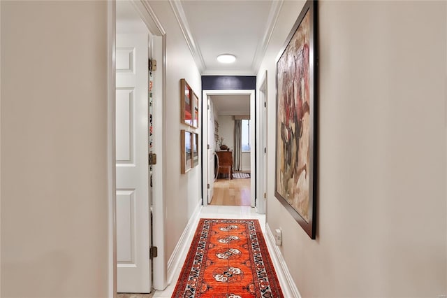 hall featuring ornamental molding