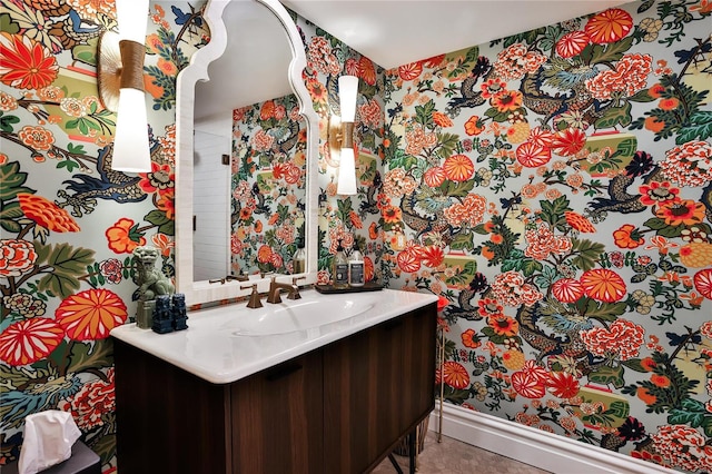 bathroom featuring tile patterned flooring and vanity