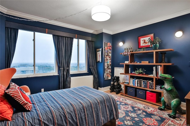 bedroom with ornamental molding