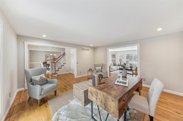 dining area with recessed lighting, light wood-type flooring, visible vents, and baseboards