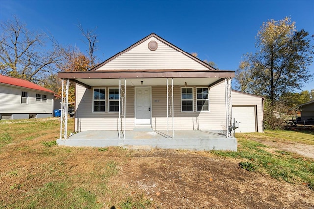 view of front of home with a front lawn and a porch