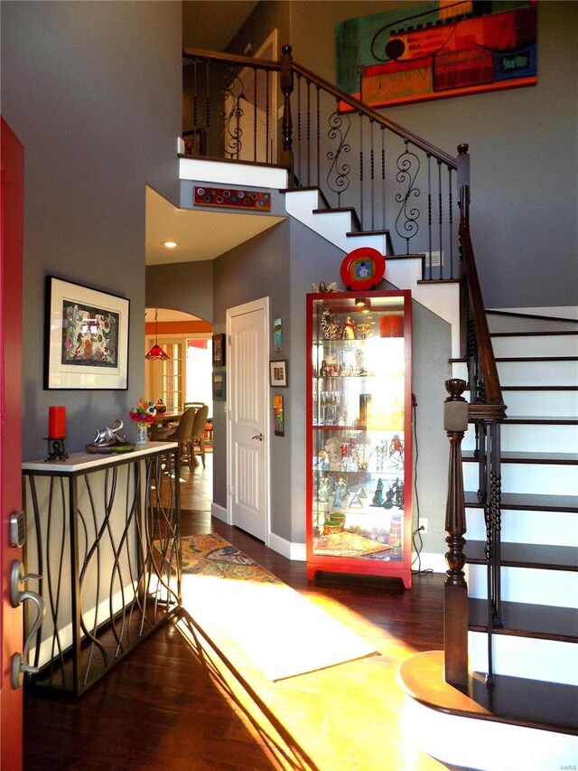 stairway with wood-type flooring