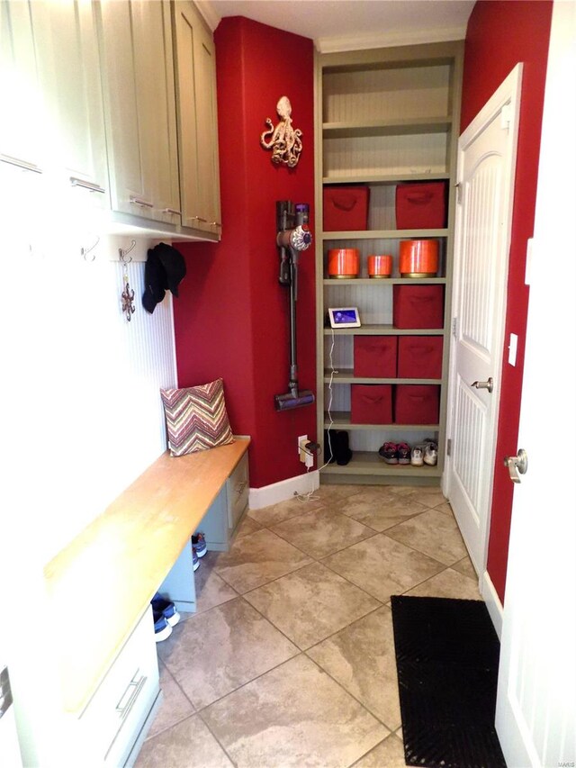 mudroom with light tile patterned flooring