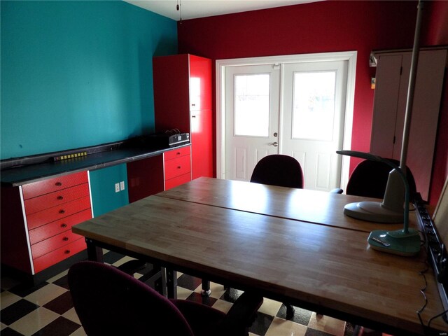 dining space featuring french doors