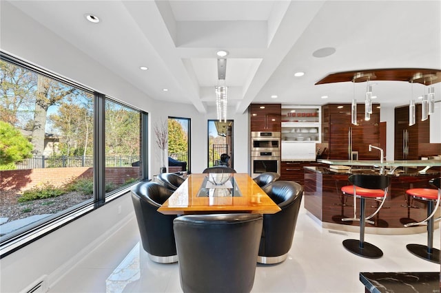 dining room with a baseboard radiator