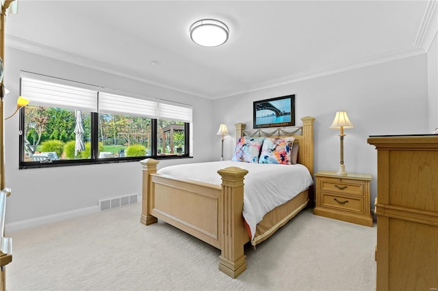 carpeted bedroom with crown molding