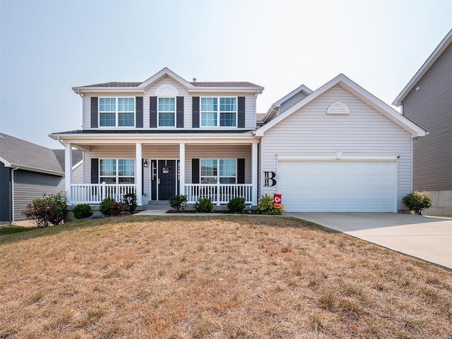 view of front of house featuring a garage, covered porch, and a front lawn