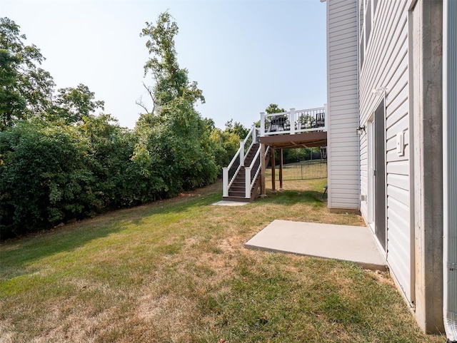 view of yard with a wooden deck