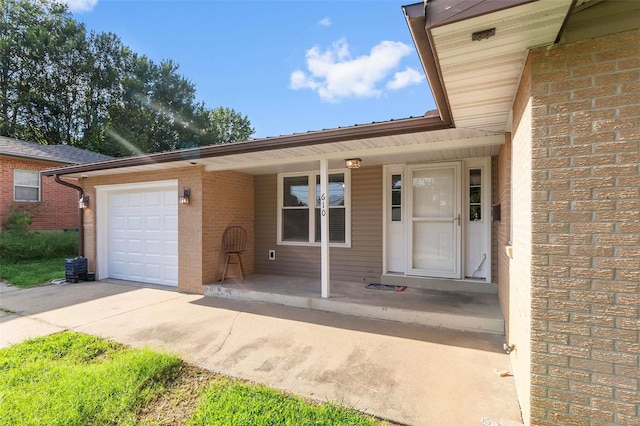 view of front facade featuring covered porch and a garage