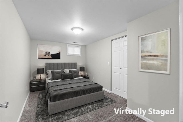 carpeted bedroom featuring a closet