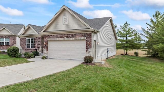 view of front of property featuring a garage and a front yard