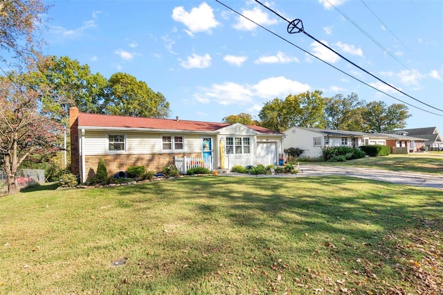 single story home featuring a front yard