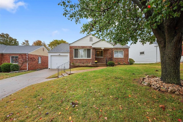 view of front of house with a garage and a front lawn