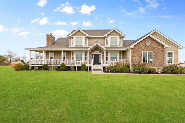 view of front facade with a front lawn and covered porch