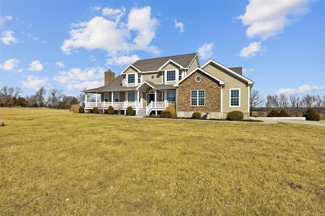 view of front of property featuring a porch, stone siding, a chimney, and a front lawn