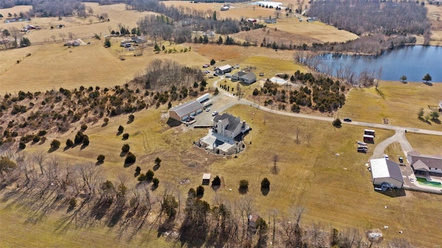 drone / aerial view with a rural view and a water view