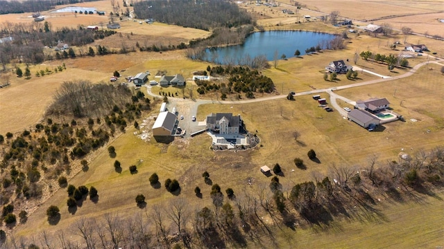 bird's eye view with a water view and a rural view