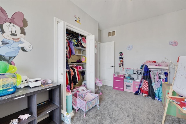 bedroom featuring carpet floors, a closet, and visible vents