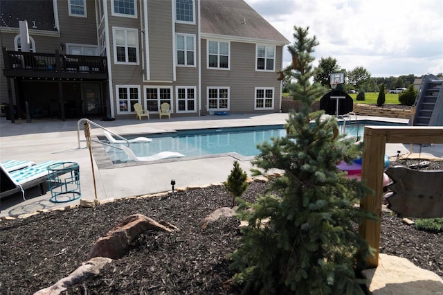 outdoor pool featuring a patio area