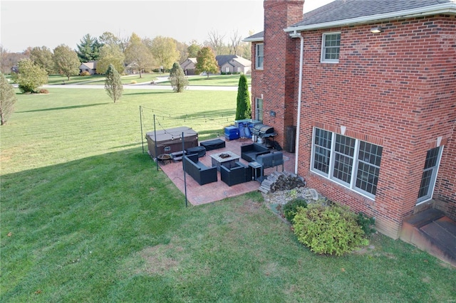 view of yard featuring an outdoor living space and a patio area