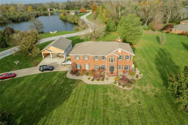 bird's eye view with a water view