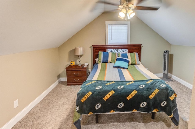 carpeted bedroom with lofted ceiling and ceiling fan