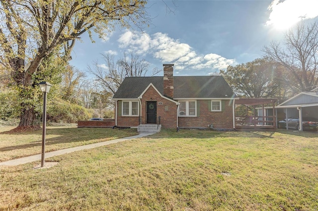 bungalow-style house with a front yard and a carport