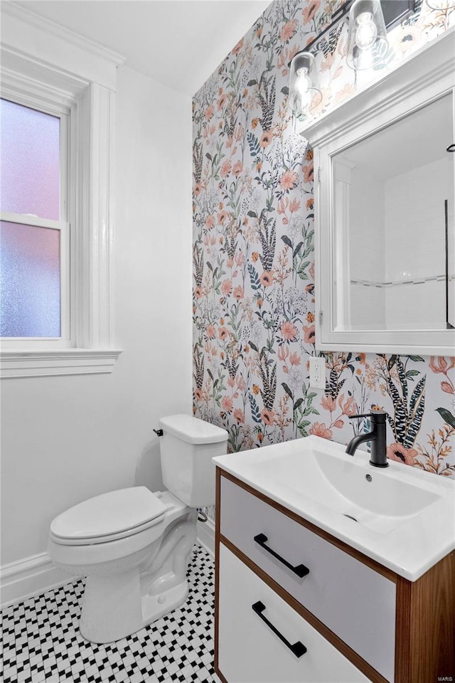 bathroom with vanity and toilet