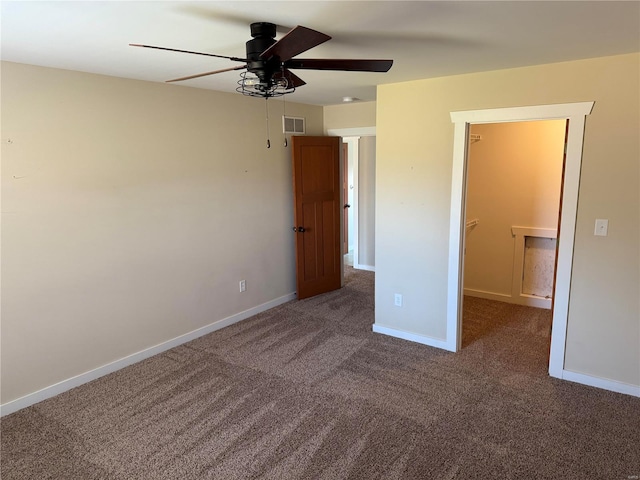 unfurnished bedroom featuring ceiling fan and carpet