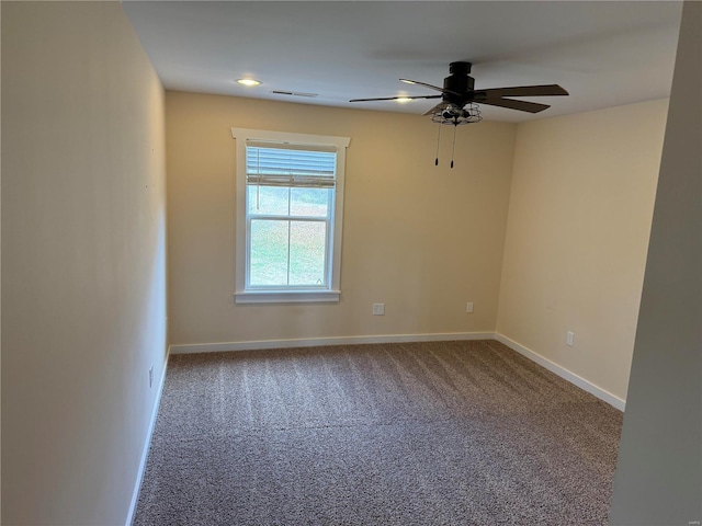 carpeted empty room with ceiling fan