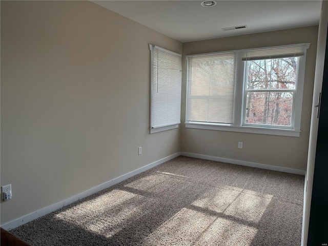 view of carpeted spare room