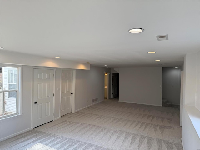 basement with light carpet