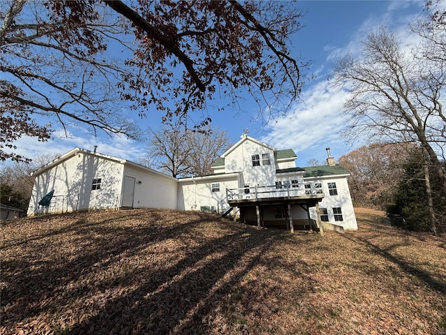 rear view of house with a deck