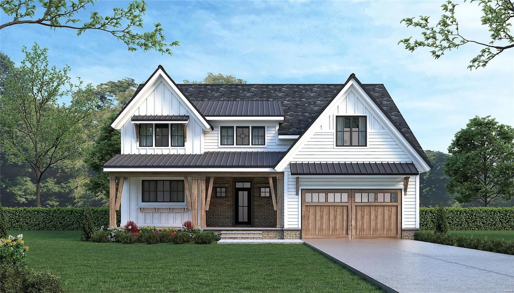 modern inspired farmhouse featuring covered porch, a front yard, and a garage