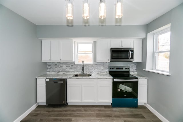 kitchen featuring white cabinets, sink, and stainless steel appliances