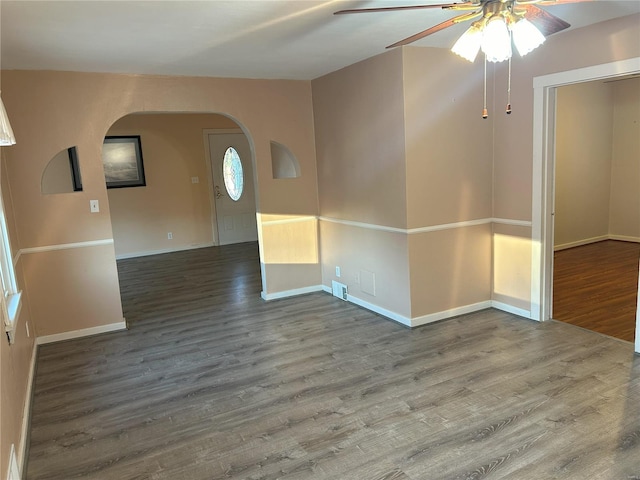 unfurnished room featuring hardwood / wood-style flooring and ceiling fan