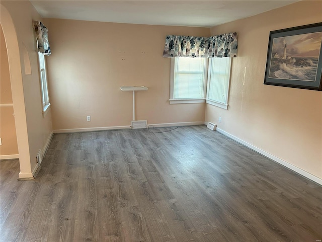 empty room featuring hardwood / wood-style floors