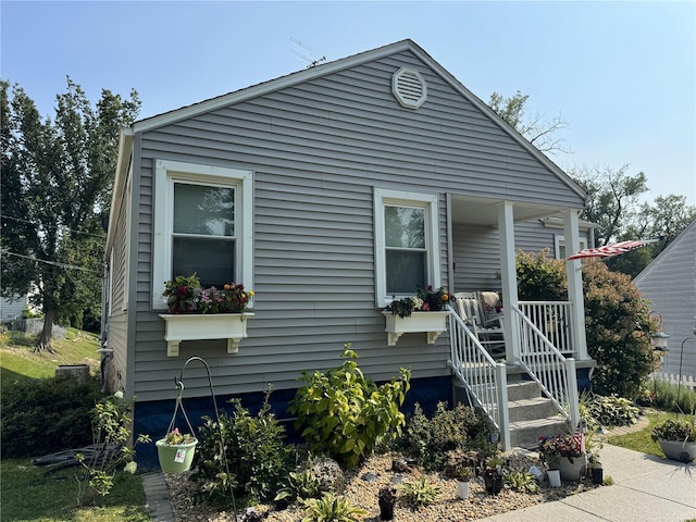 view of home's exterior with a porch