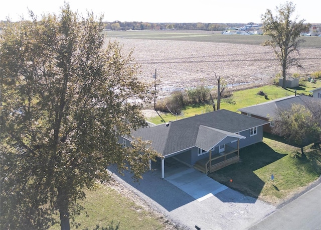 birds eye view of property featuring a rural view