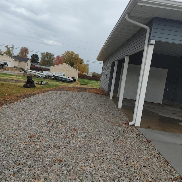 view of yard featuring a garage