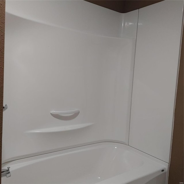 bathroom featuring bathing tub / shower combination