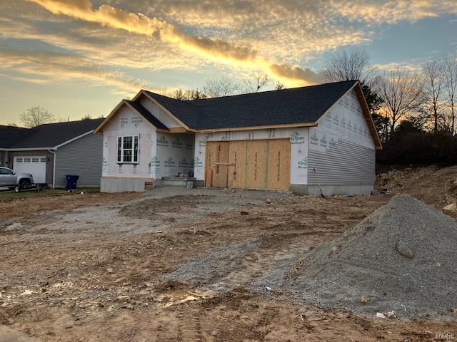 exterior space with a garage